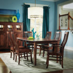 Prestige Chair, Maple Wood & 111 Boston Stain. Boat Top Table with two 12" Leaves, Chamfer Edge, Shaker Leg, Maple Wood & 111 Boston Stain. New England Cabinet, Maple Wood & 111 Boston Stain. image of prestige dining group